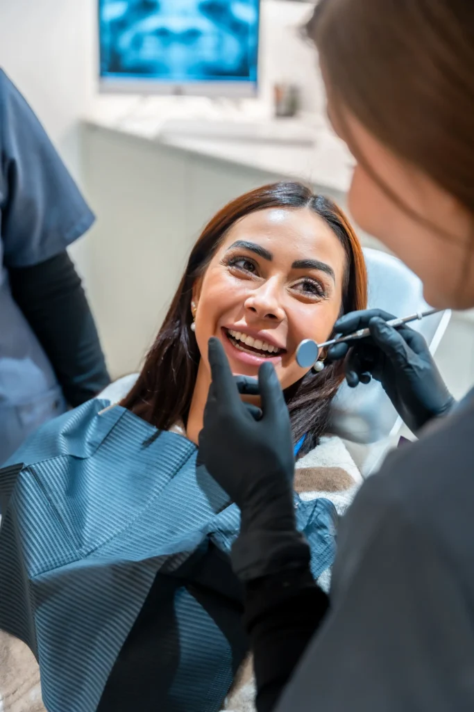 Dentist performing a root canal treatment on a relaxed patient at Southtown Family Dental in Kansas City, MO.